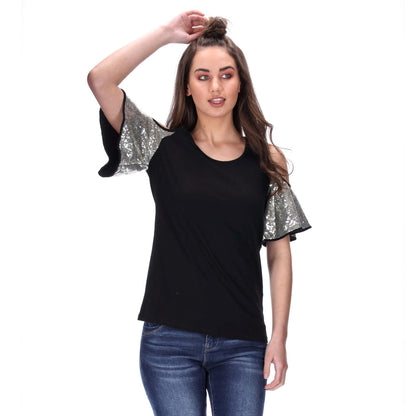 black cold shoulder tee with gold sequin sleeves